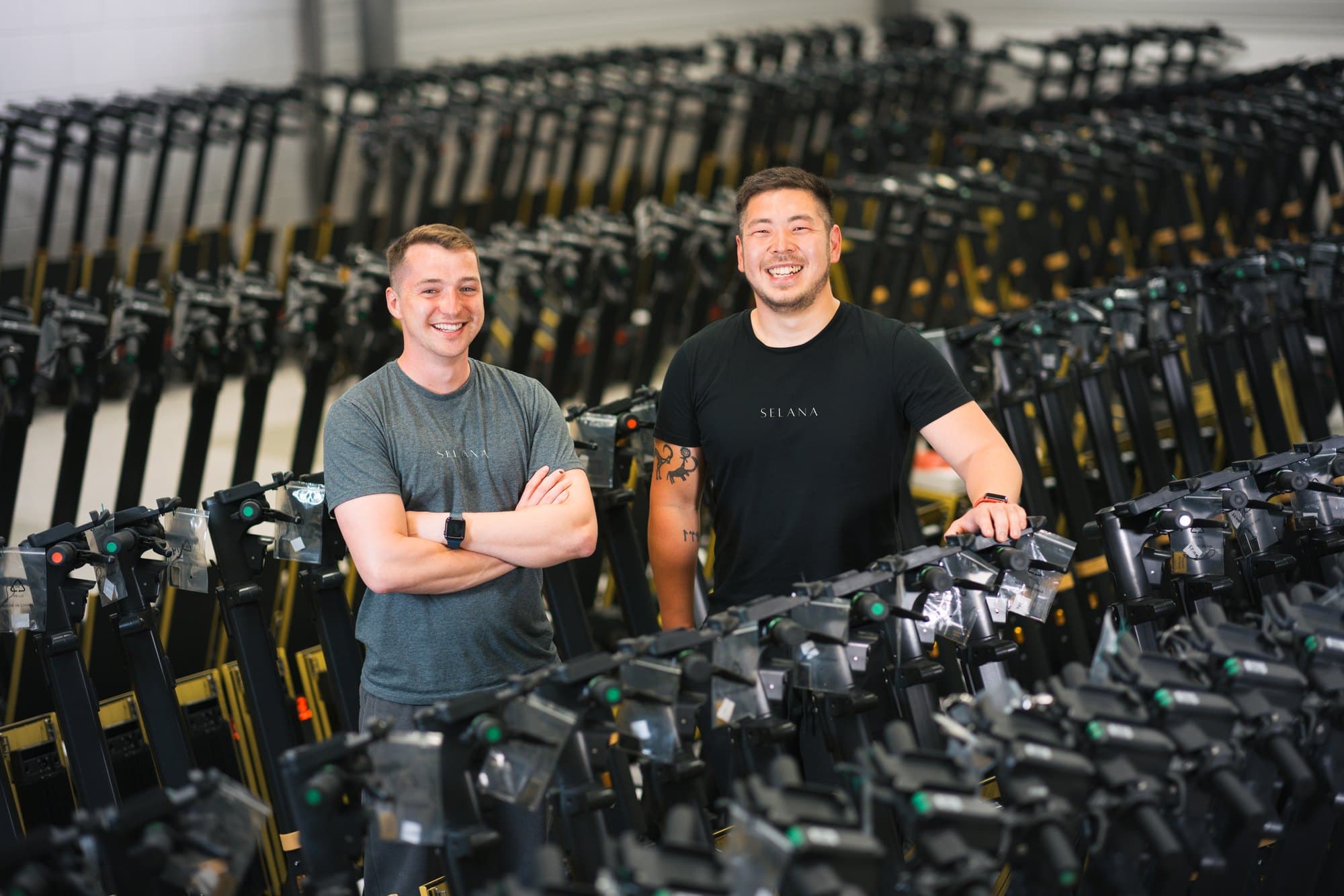 The Fleetser founders in the warehouse with a fleet being prepared